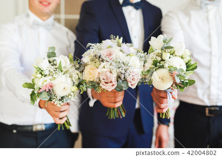 Wonderful luxury wedding bouquet of different flowers 42004802