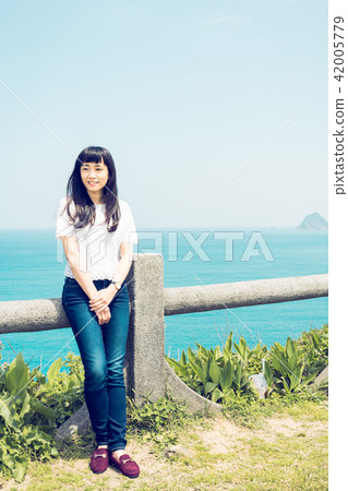 Asia Taiwan Keelung white rice turret battery female woman girl ocean grass portrait portrait 42005779