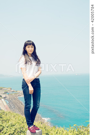 Asia Taiwan Keelung white rice turret battery female woman girl ocean grass portrait portrait 42005784
