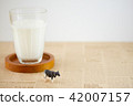 Miniature cow and milk 42007157