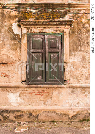 Old window on Old wall Old window on Old wall 42007758