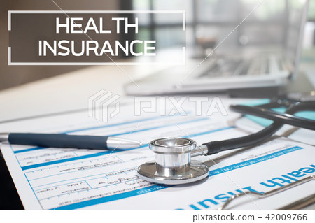 Insurance health concept, paper insurance on table Insurance health concept, paper insurance on table 42009766