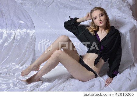 Sexy beautiful woman with in white blouse 42010200