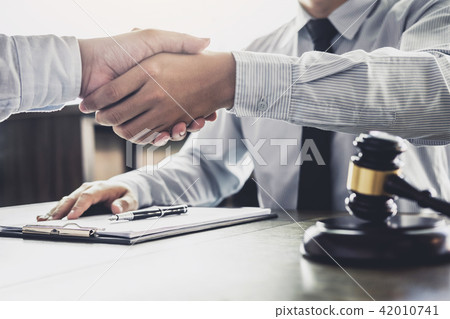 Handshake after good cooperation, Businessman handshake male law Handshake after good cooperation, Businessman handshake male law 42010741