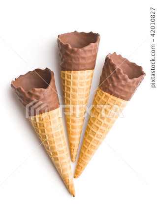 Ice cream cone with chocolate. Ice cream cone with chocolate. 42010827