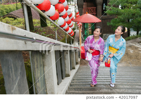 two kimono Asian girl walking on staircase two kimono Asian girl walking on staircase 42017097