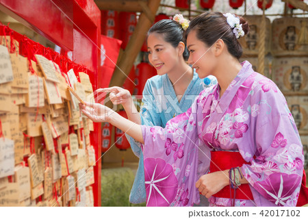 woman making their wishes woman making their wishes 42017102