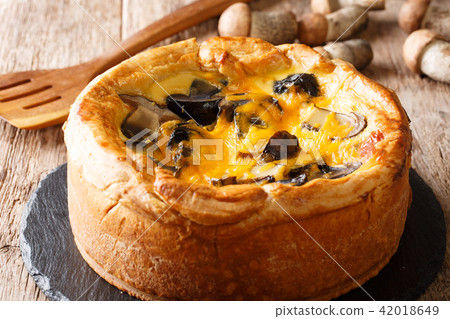 Tasty pie, quiche, pizza with mushrooms, cheddar 42018649