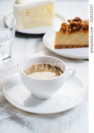 cup of coffee with cake cup of coffee with cake 42019107