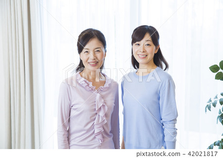 Mother and daughter Mother and daughter 42021817