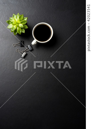 Office desktop with cup of coffee 42023541