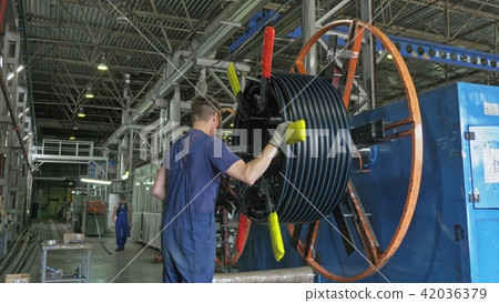 Roll threading coil pipe. Manufacture of plastic water pipes factory. Process of making plastic 42036379