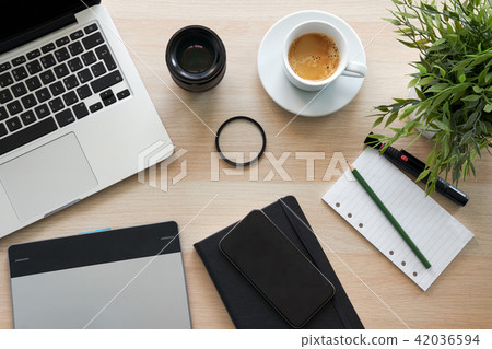 Top view of office work desk with laptop Top view of office work desk with laptop 42036594