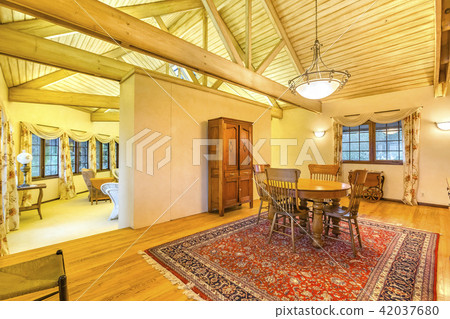 Dining Room With Vaulted Ceilings And Modern Stock Photo