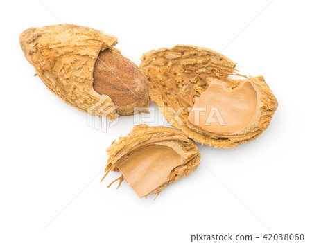 Raw almonds isolated on white Raw almonds isolated on white 42038060