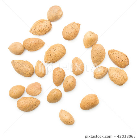 Raw almonds isolated on white Raw almonds isolated on white 42038063