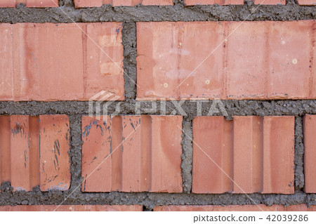 Brick wall close-up pattern texture background 42039286