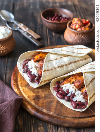 Chicken burritos with ingredients Chicken burritos with ingredients 42039361