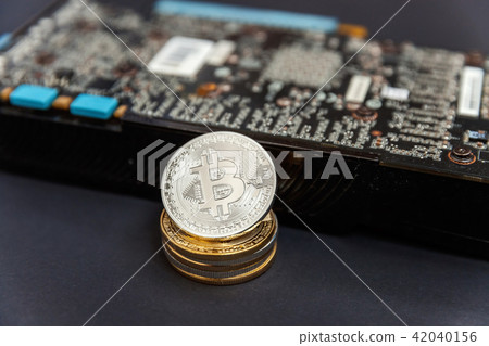 Bitcoins lie on the video card 42040156
