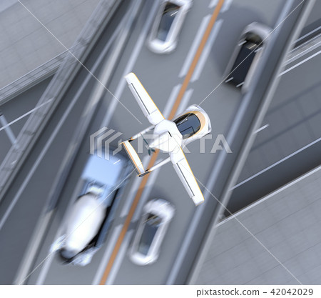 Concept image of a flying car (flying car) passing over a row of highway congestion 42042029