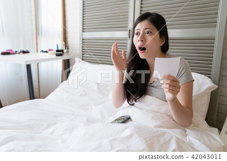 young female is shocked that the miracle young female is shocked that the miracle 42043011
