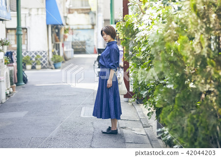 A woman walking 42044203