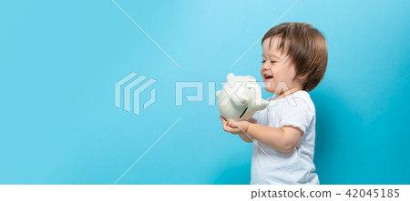 Toddler Boy With A Piggy Bank Stock Photo 42045185 Pixta