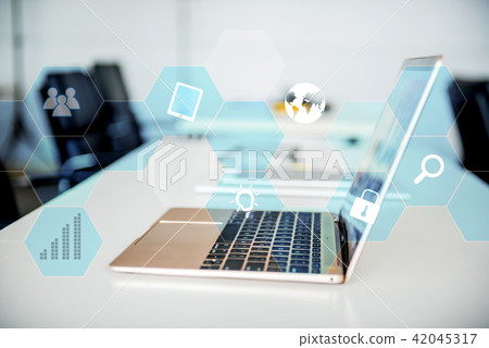 laptop on the table in the meeting room.  42045317