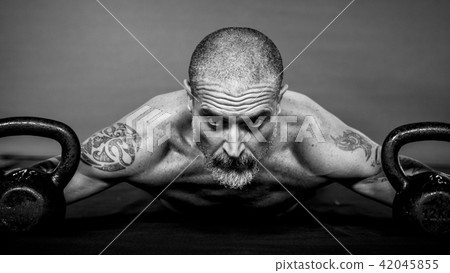 Close up of Athlete With Weight 42045855