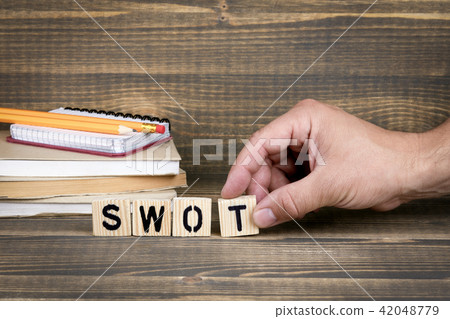 Swot. Wooden letters on the office desk Swot. Wooden letters on the office desk 42048779