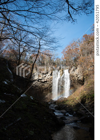 Ashiribetsu waterfall Waterfall with rainbow over Ashiribetsu waterfall Waterfall with rainbow over 42051795
