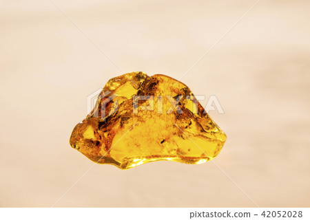 amber in sun on a beach of the Baltic sea amber in sun on a beach of the Baltic sea 42052028