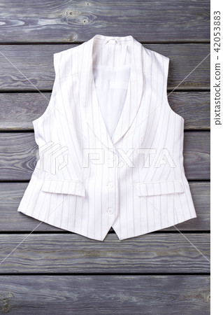 Flat lay white business sleeveless jacket. Flat lay white business sleeveless jacket. 42053883