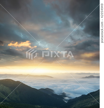 Mountain panorama during sunrise. 42054949