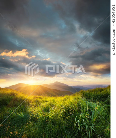 Mountain valley during sunset. Mountain valley during sunset. 42054951