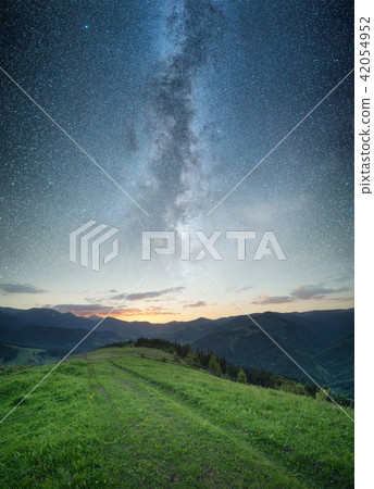 Sunset in the mountain valley. Sunset in the mountain valley. 42054952