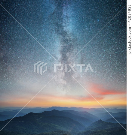 Mountains and sky at the night time. Mountains and sky at the night time. 42054953