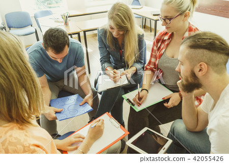 Group of people students working together Group of people students working together 42055426