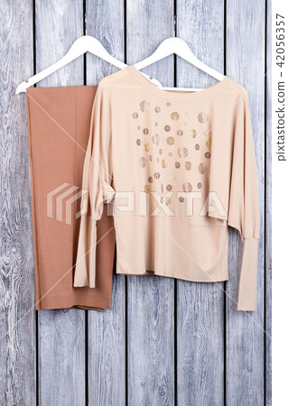 Flat lay stylish female summer clothing. Flat lay stylish female summer clothing. 42056357