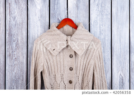 Winter wool on hanger, close up. Winter wool on hanger, close up. 42056358