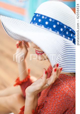 Portrait of attractive woman with hat 42056414