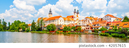 Telc Panorama. Water reflection of houses and Telc Castle, Czech Republic. UNESCO World Heritage Telc Panorama. Water reflection of houses and Telc Castle, Czech Republic. UNESCO World Heritage 42057615