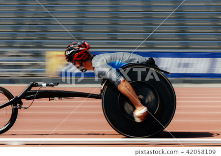 men racer on wheelchair 42058109