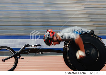 athlete racer on wheelchair 42058110