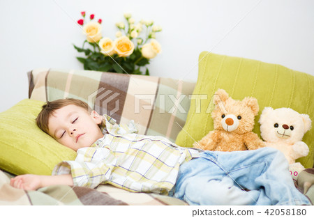 Cute little boy is sleeping Cute little boy is sleeping 42058180