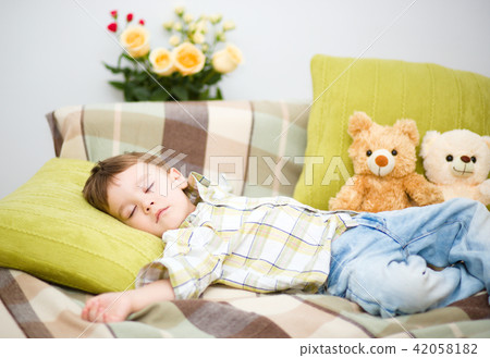 Cute little boy is sleeping Cute little boy is sleeping 42058182