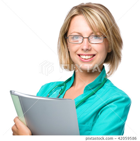 Portrait of a woman wearing doctor uniform 42059586