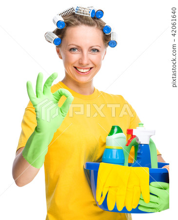 Young woman as a cleaning maid 42061640