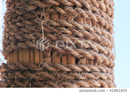 Rope wrapped around the pole Rope wrapped around the pole 42061859