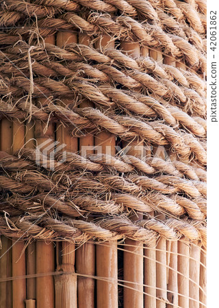 Rope wrapped around the pole Rope wrapped around the pole 42061862